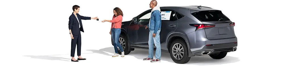 A young lady in an orange sweater receives the keys to her new SUV. She beams knowing she’s got State Farm Auto Insurance.